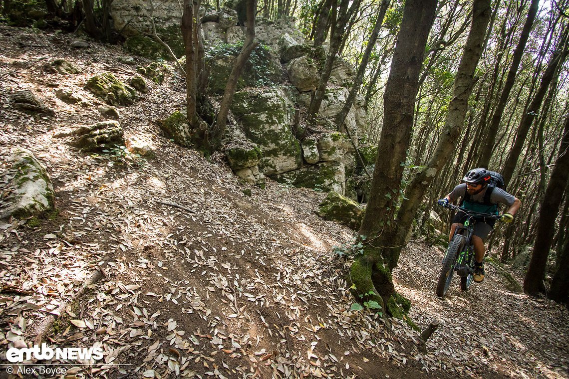 Start a long way back with your weight forward and in the first gear start pedalling fast...