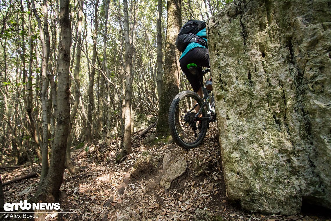 As the rear wheel crests the feature put your weight back again on the saddle to maintain grip and keep riding
