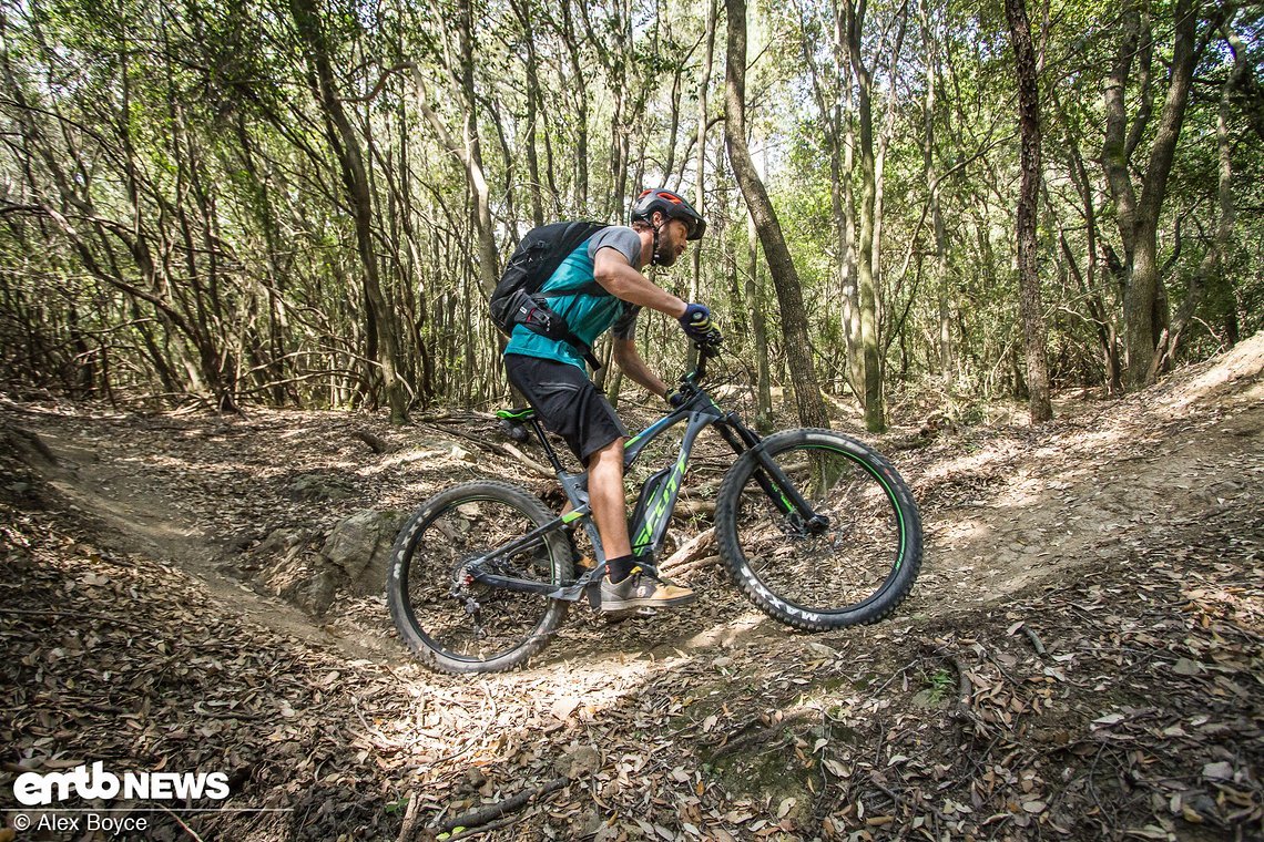 keep pedalling but let the bike g-out as the surface direction changes.