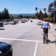 Waiting to cross a large intersection, cyclists feel vulnerable.